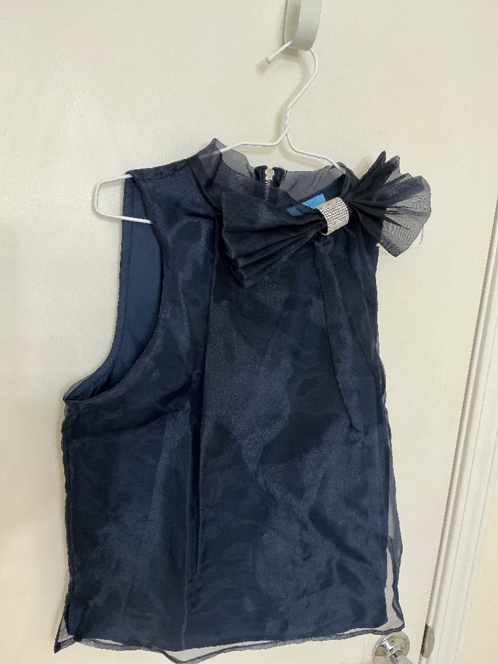 CeCe Sleeveless Top Sheer Overlay Navy Blue Bow at Neck With Rhinestone Accent